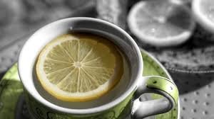 A glass of warm water with lemon to boost digestion