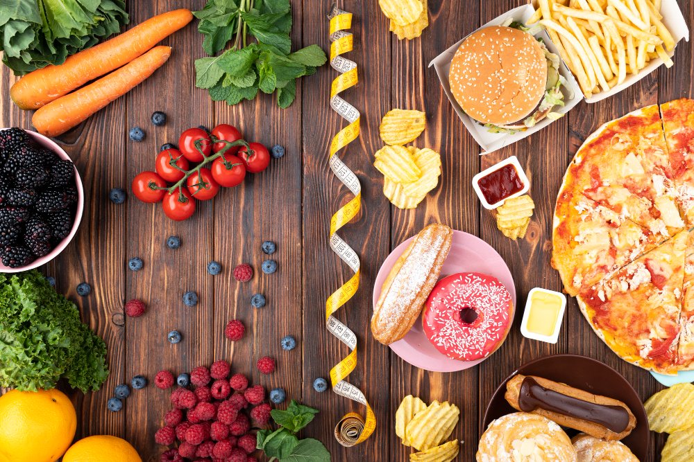 Split image showing healthy fruits and vegetables on the left and processed fast foods on the right, divided by a decorative ribbon.